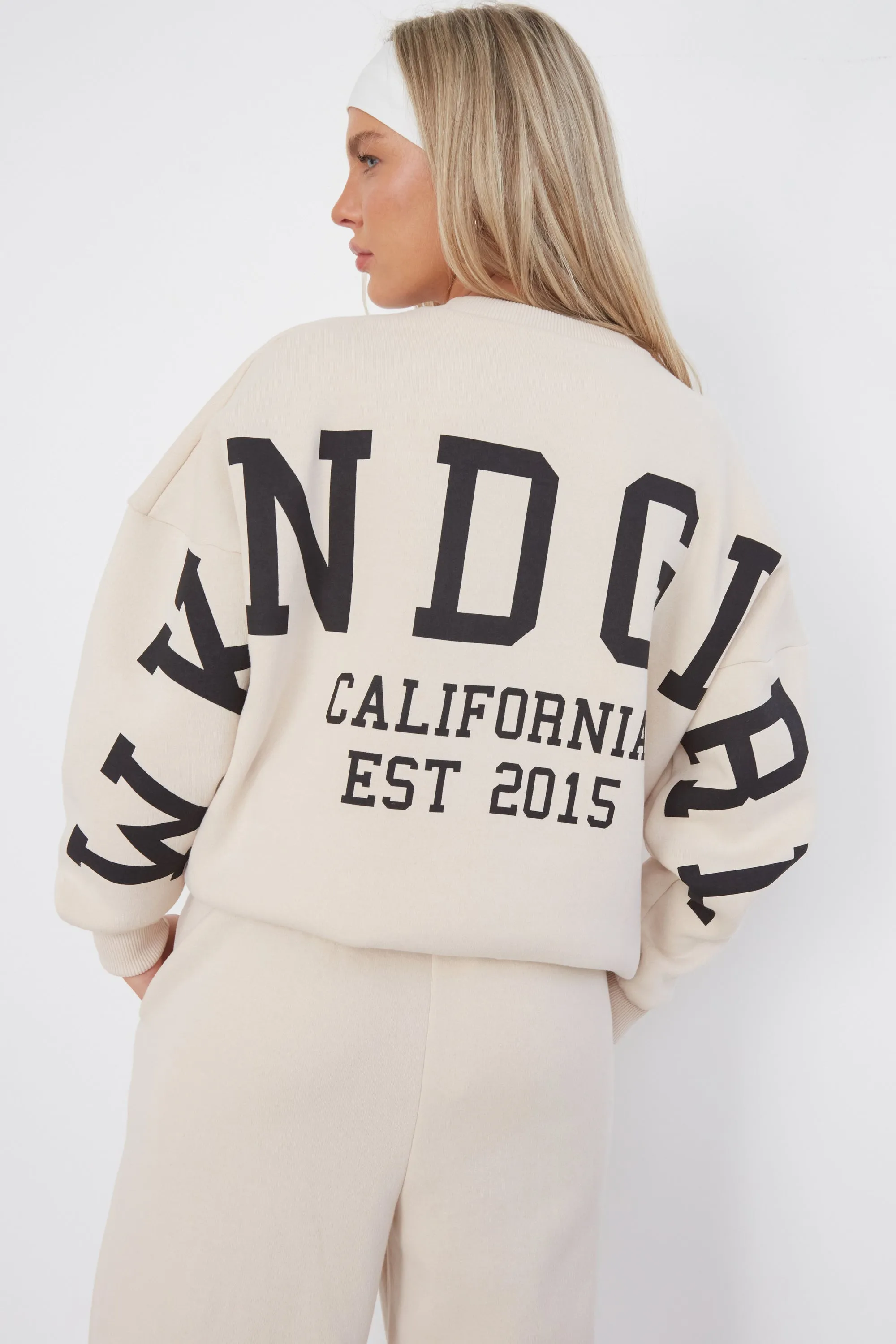 WKND GIRL VARSITY OVERSIZED SWEAT